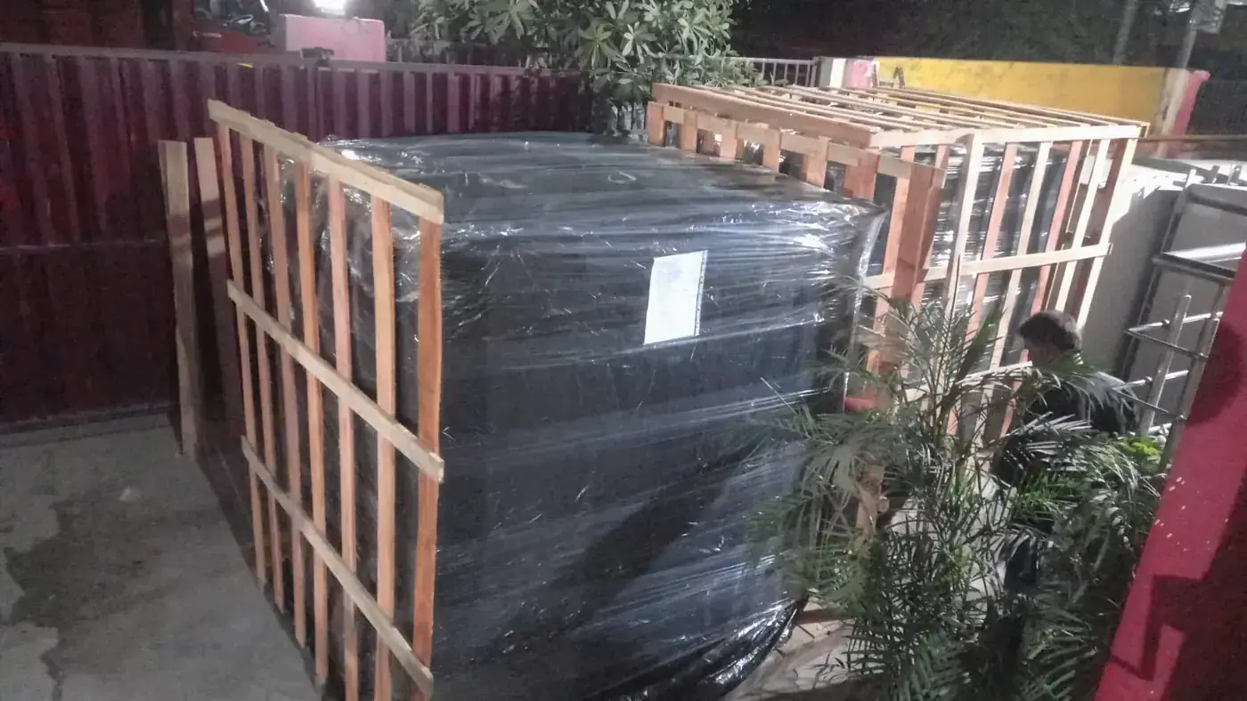 Industrial equipment being professionally packed on site